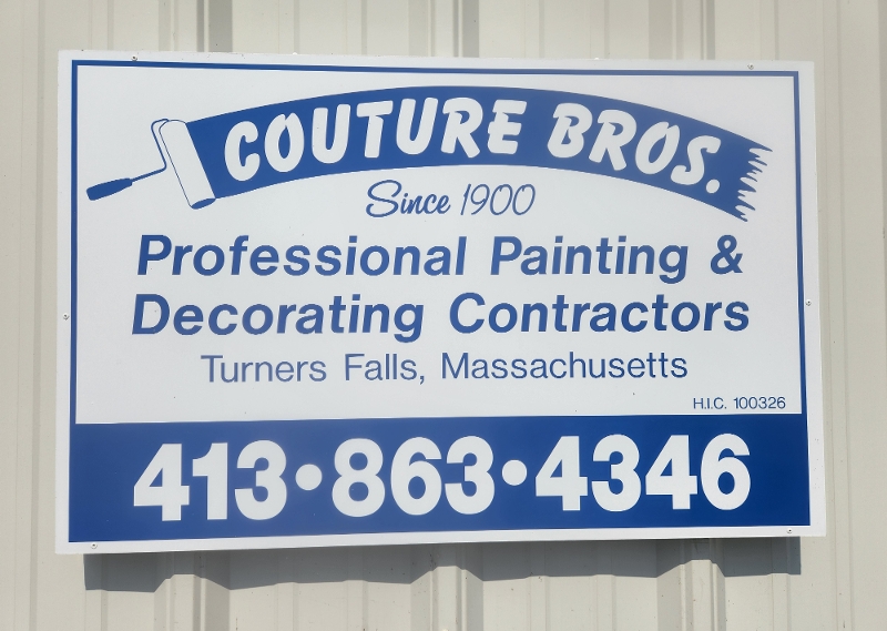 Couture Bros. sign with phone number